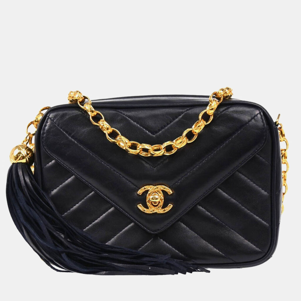 luxury-women-chanel-used-handbags-p1161993-001 Chanel Navy Chevron Lambskin Vintage Front Pocket Small Camera Bag