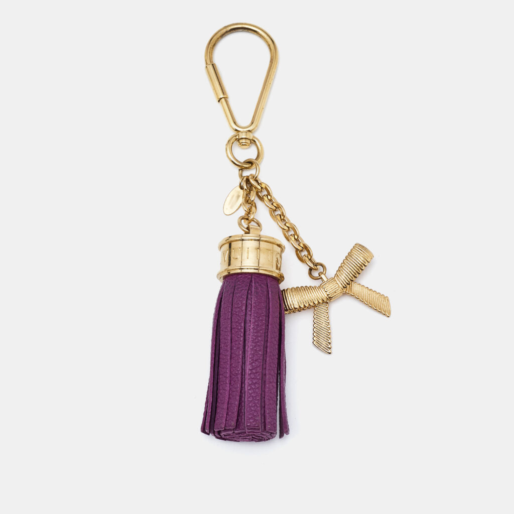 luxury-women-louis-vuitton-used-accessories-p1126551-002 Louis Vuitton Leather Tassel Bow Gold Tone Bag Charm