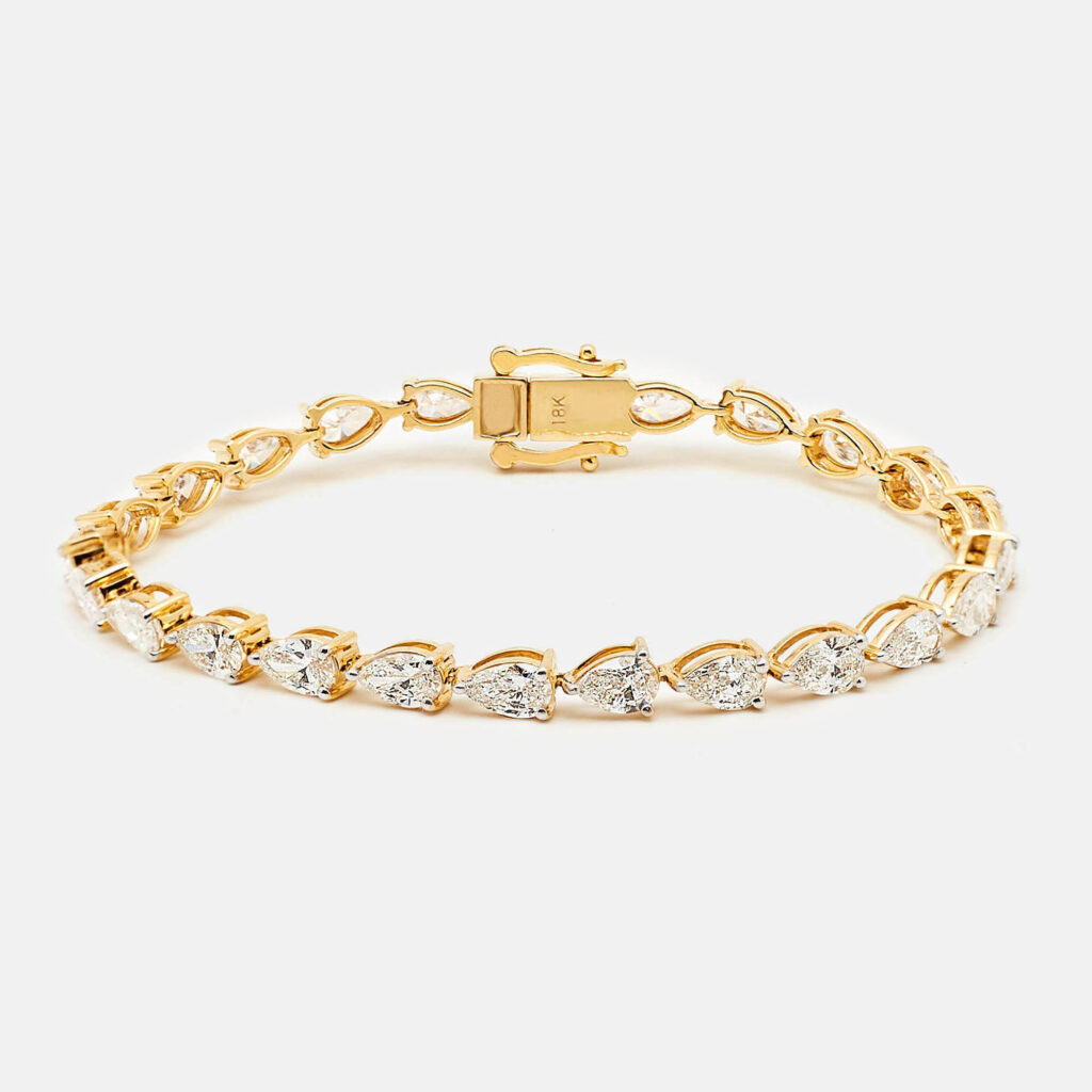 luxury-women-the-diamond-edit-new-fine-jewelry-p1104947-001.jpg 7.6 cts Pear Brilliant 18k Yellow Gold Lab Grown Diamonds Bracelet