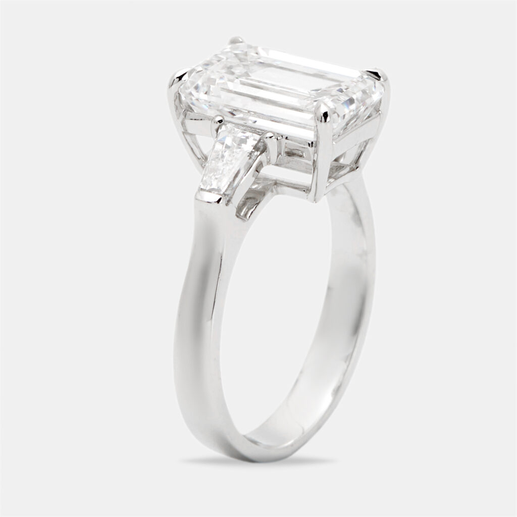 luxury-women-the-diamond-edit-new-fine-jewelry-p1165679-003.jpg 4.60 cts Emerald Cut and Trapezoid Lab Grown Diamond 18k White Gold Ring Size 52