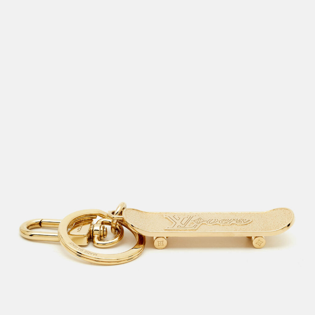 luxury-men-louis-vuitton-used-accessories-p1243057-005.jpg Louis Vuitton Gold Tone LV Skate Bag Charm & Key Holder
