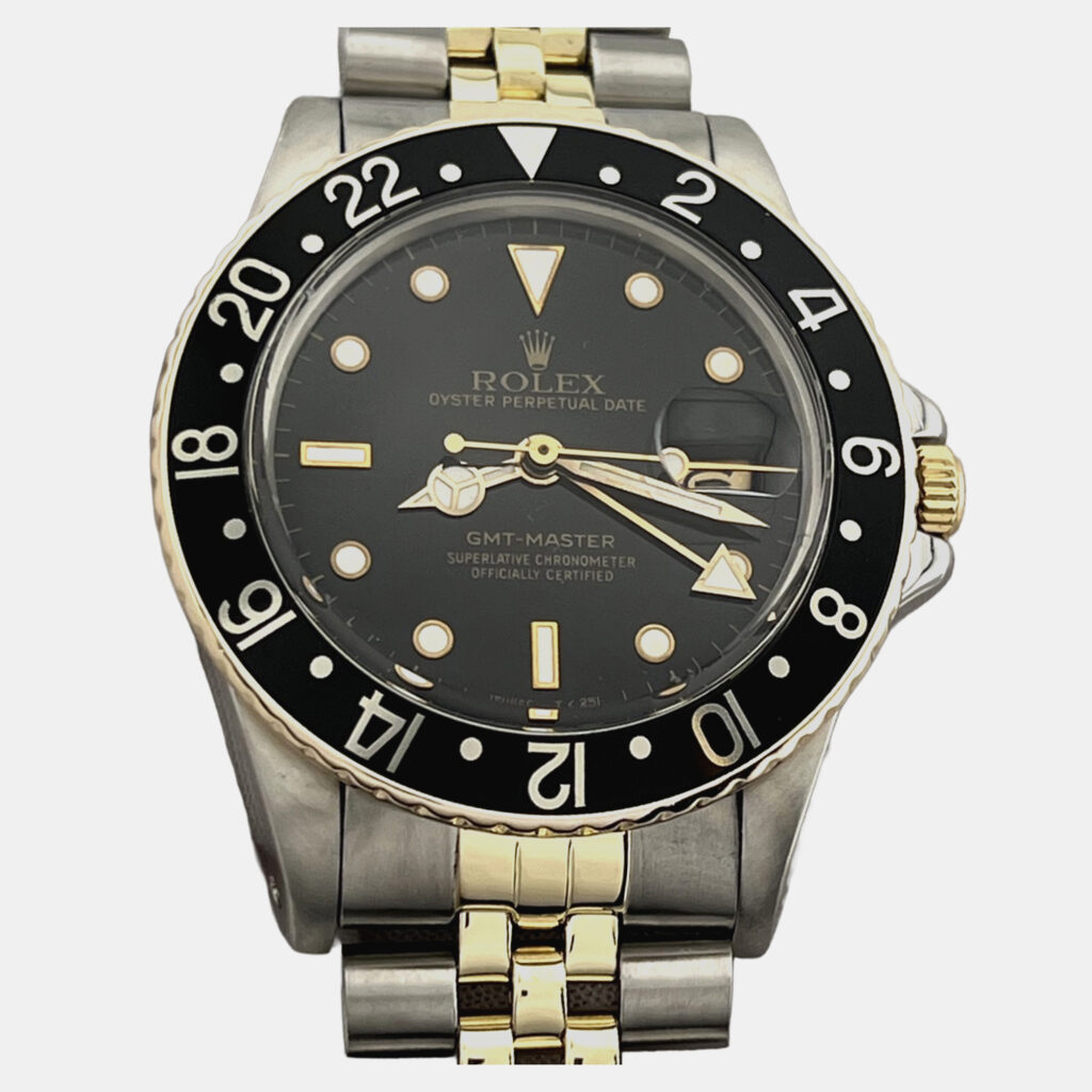 Rolex GMT Master 16753 Automatic Black & Yellow 18K Yellow Gold Stainless Steel Men's Wristwatch 40 mm Rolex GMT Master 16753 Automatic Black & Yellow 18K Yellow Gold Stainless Steel Men's Wristwatch 40 mm
