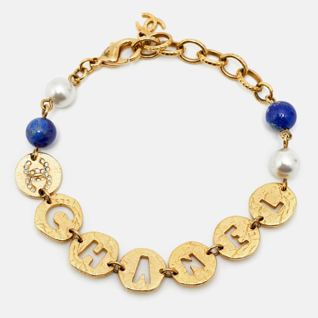 luxury-women-chanel-used-accessories-p1218705-005.jpg Chanel CC Crystals Faux Pearl Beads Gold Tone Cutwork Logo Charm Beaded Bracelet