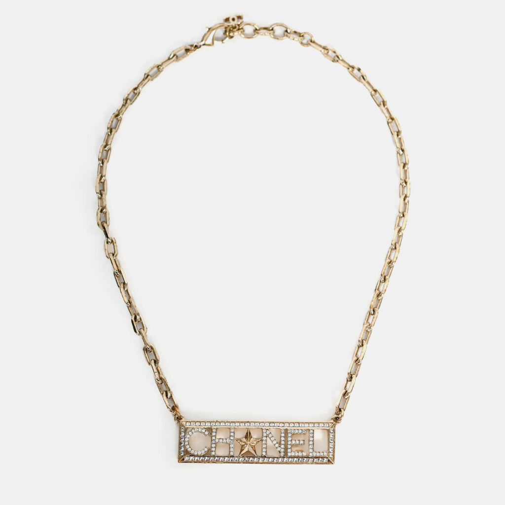 luxury-women-chanel-used-accessories-p1247872-003-1.jpg Chanel 2017 Gold Toned Crystal Embellished Logo Star Choker Necklace