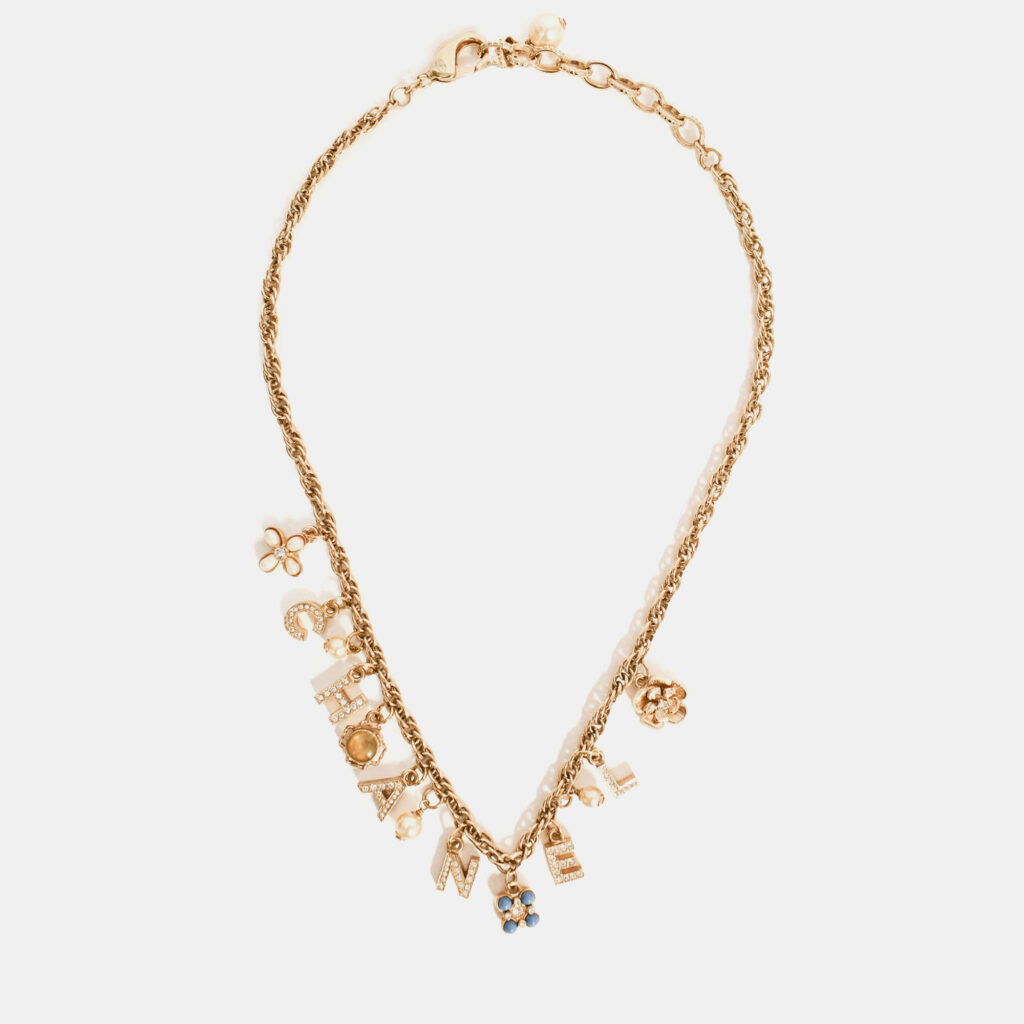 Chanel 2019 Gold Tone Faux Pearl 'CHANEL' Charm Necklace Chanel 2019 Gold Tone Faux Pearl 'CHANEL' Charm Necklace