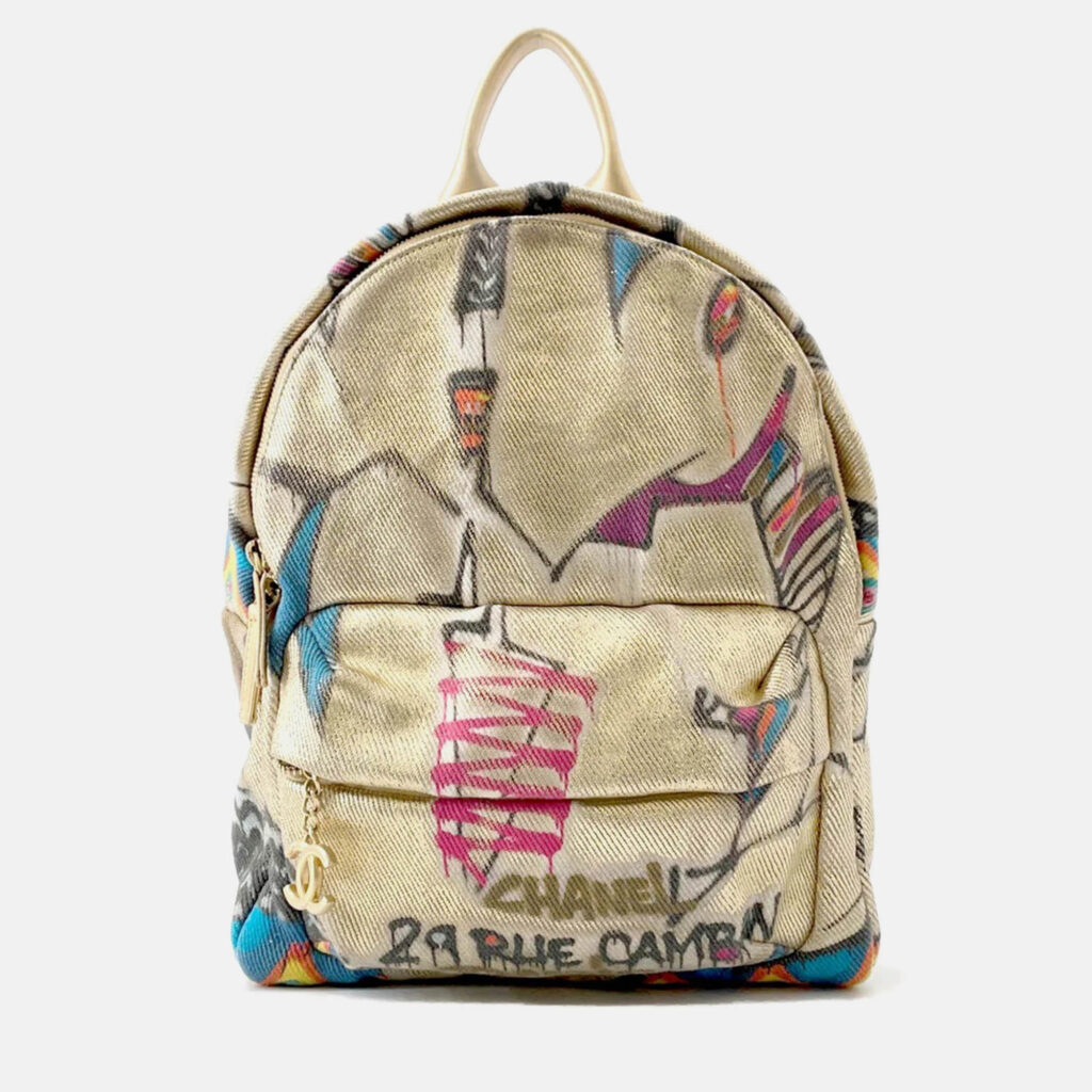 Chanel Cc Logo Graffiti Backpack Gold/Multicolor Canvas Leather Chanel Cc Logo Graffiti Backpack Gold/Multicolor Canvas Leather