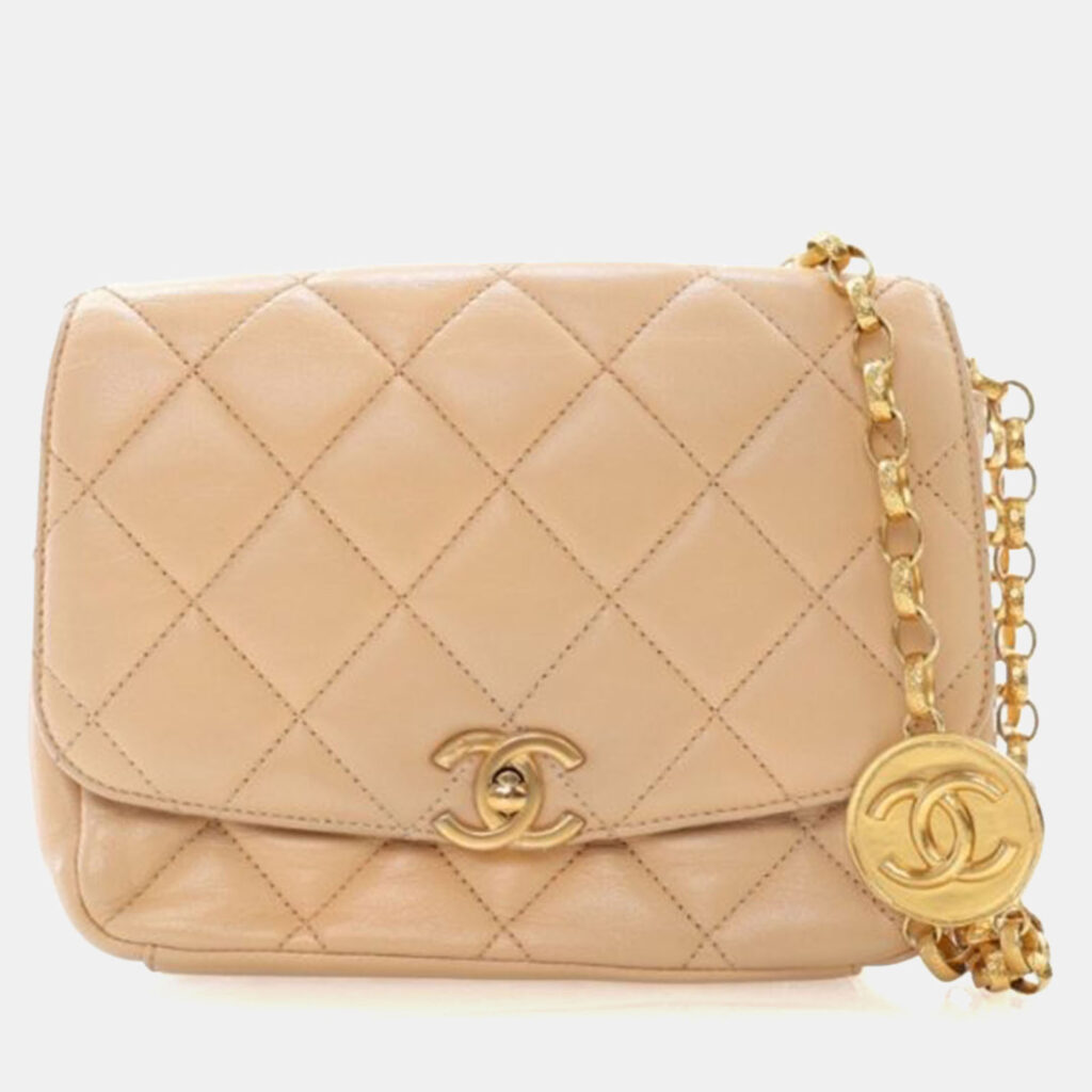 Chanel Beige Lambskin CC Coin Chain Flap Bag Chanel Beige Lambskin CC Coin Chain Flap Bag