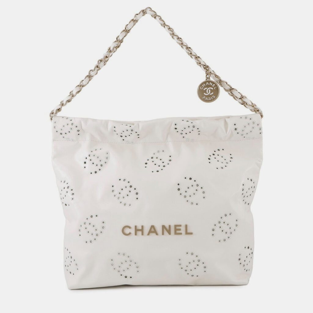 Chanel 22 Matelasse Perforated Small Handbag In Shiny Calfskin Leather White