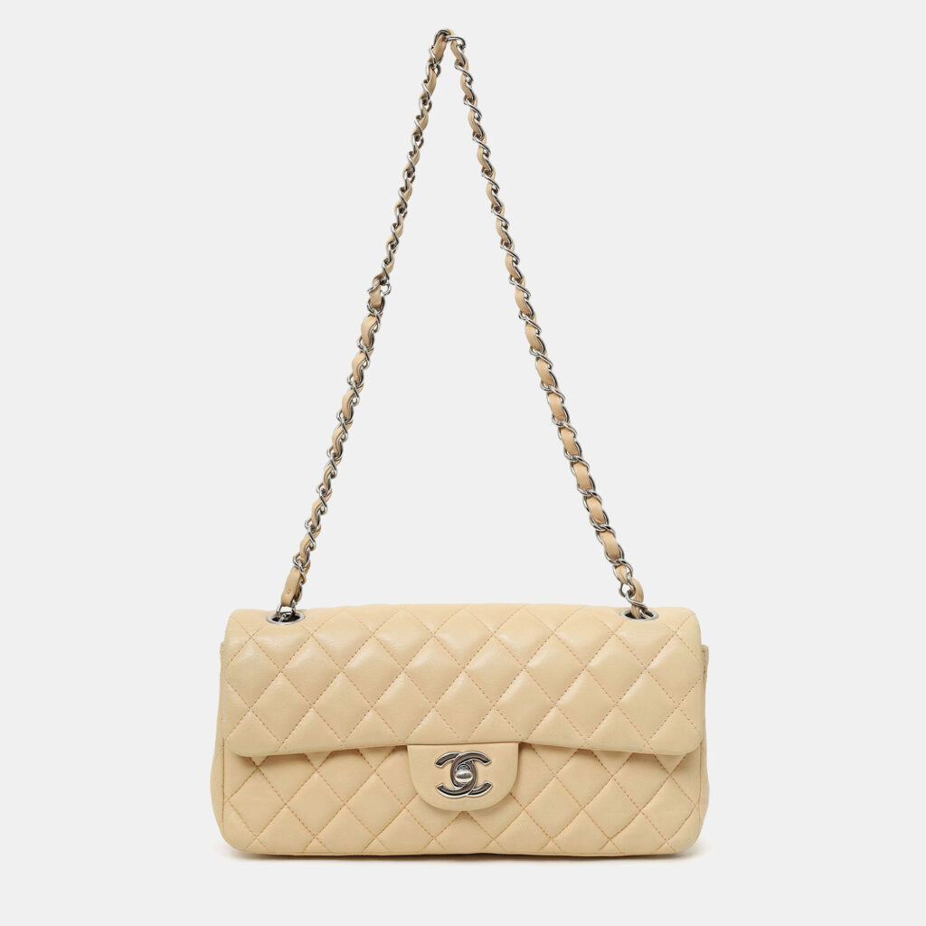 luxury-women-chanel-used-handbags-p1247767-001-1.jpg Chanel 2010-11 Beige Quilted Lambskin East/West Single Flap Bag