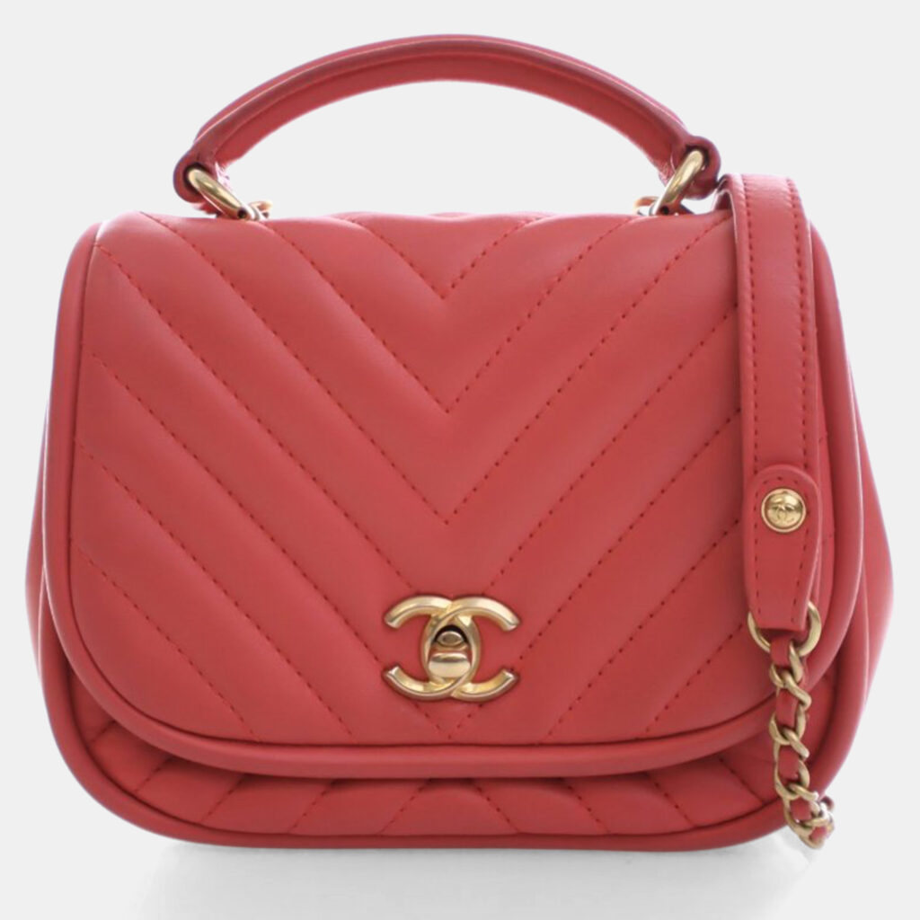 Chanel Mini Lambskin Reversed Round Flap Bag