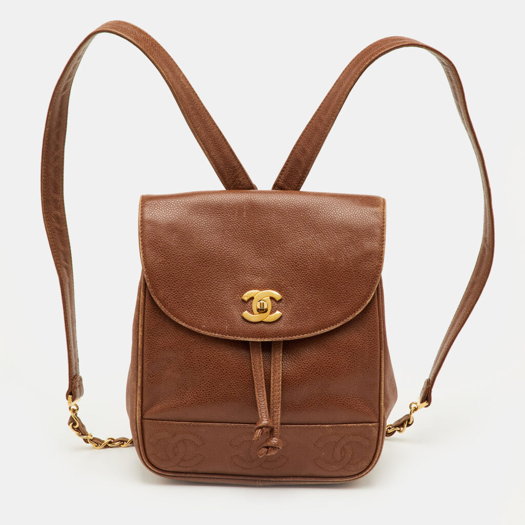 luxury-women-chanel-used-handbags-p1250942-016-1.jpg Chanel CC Drawstring Vintage Brown Caviar Leather Backpack