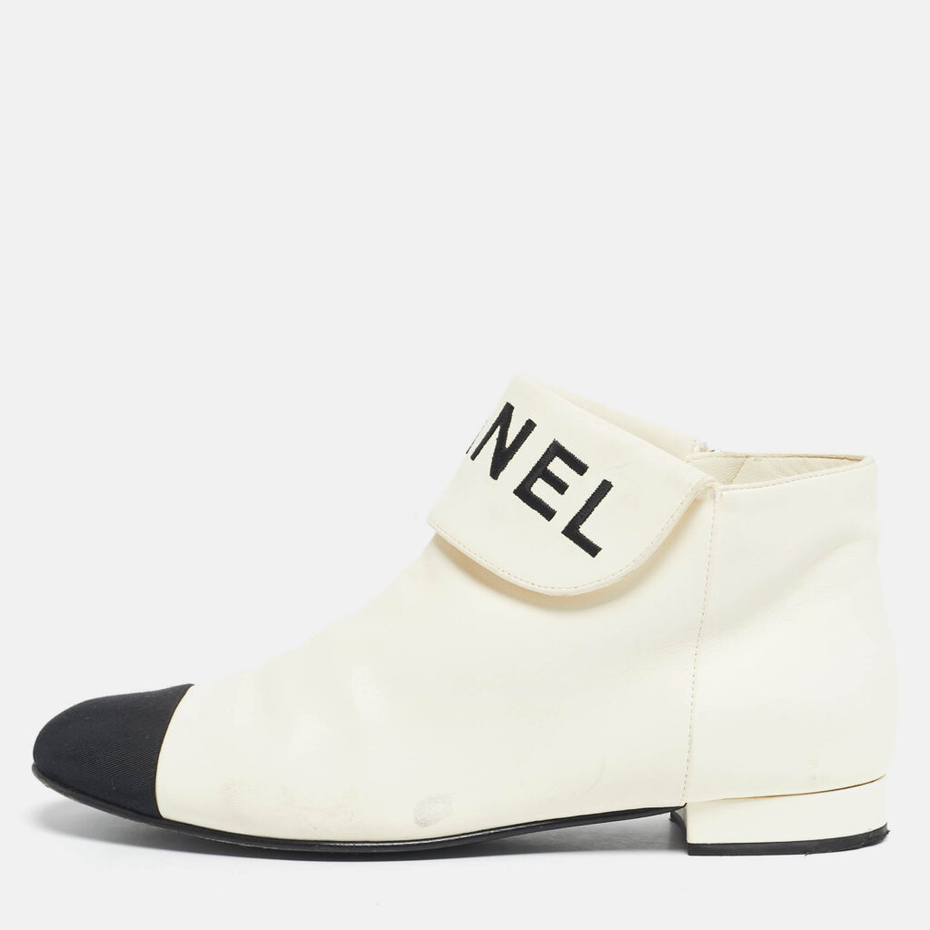 Chanel Ivory/Black Leather Logo Cap Toe Ankle Length Boots Size 38.5 Chanel Ivory/Black Leather Logo Cap Toe Ankle Length Boots Size 38.5