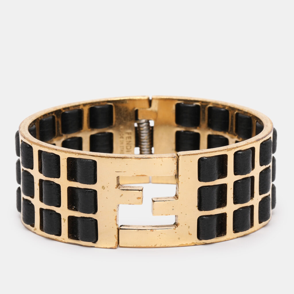 luxury-women-fendi-used-accessories-p1237268-001.jpg Fendi FF Gold Tone Metal and Black Leather Detail Cuff Bracelet