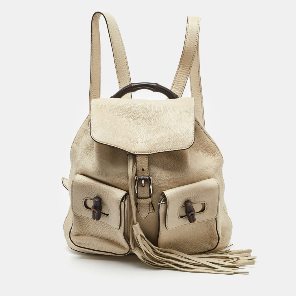 Gucci Off White Pebbled Leather GG Bamboo Tassel Backpack Gucci Off White Pebbled Leather GG Bamboo Tassel Backpack
