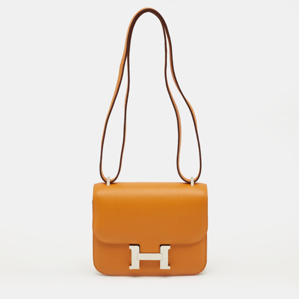 luxury-women-hermes-new-handbags-p1222161-007.jpg Hermes Abricot/Rouge Evercolor Leather Palladium Finish Constance 18 Mini Bag