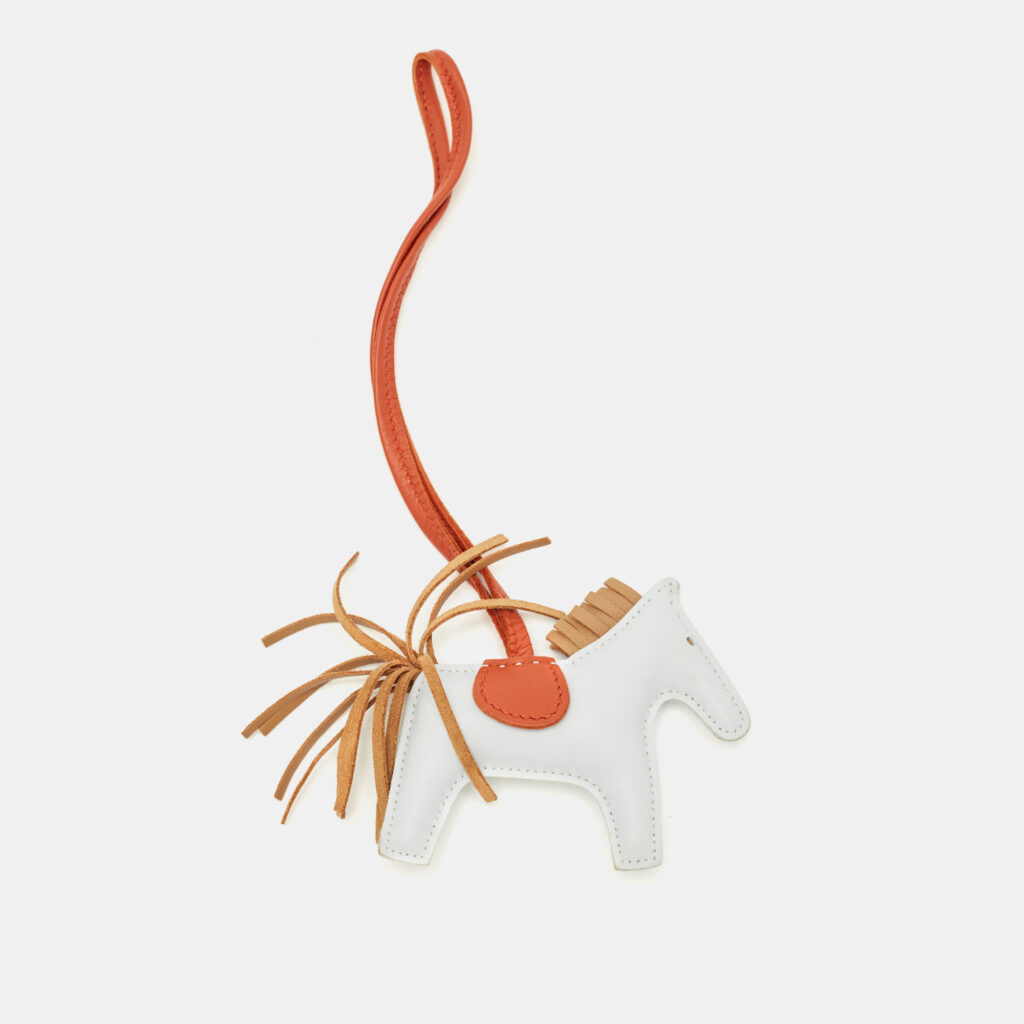 Hermès Bleu Brume/Chai/Cornaline Milo Leather GriGri Rodeo Bag Charm PM Hermès Bleu Brume/Chai/Cornaline Milo Leather GriGri Rodeo Bag Charm PM
