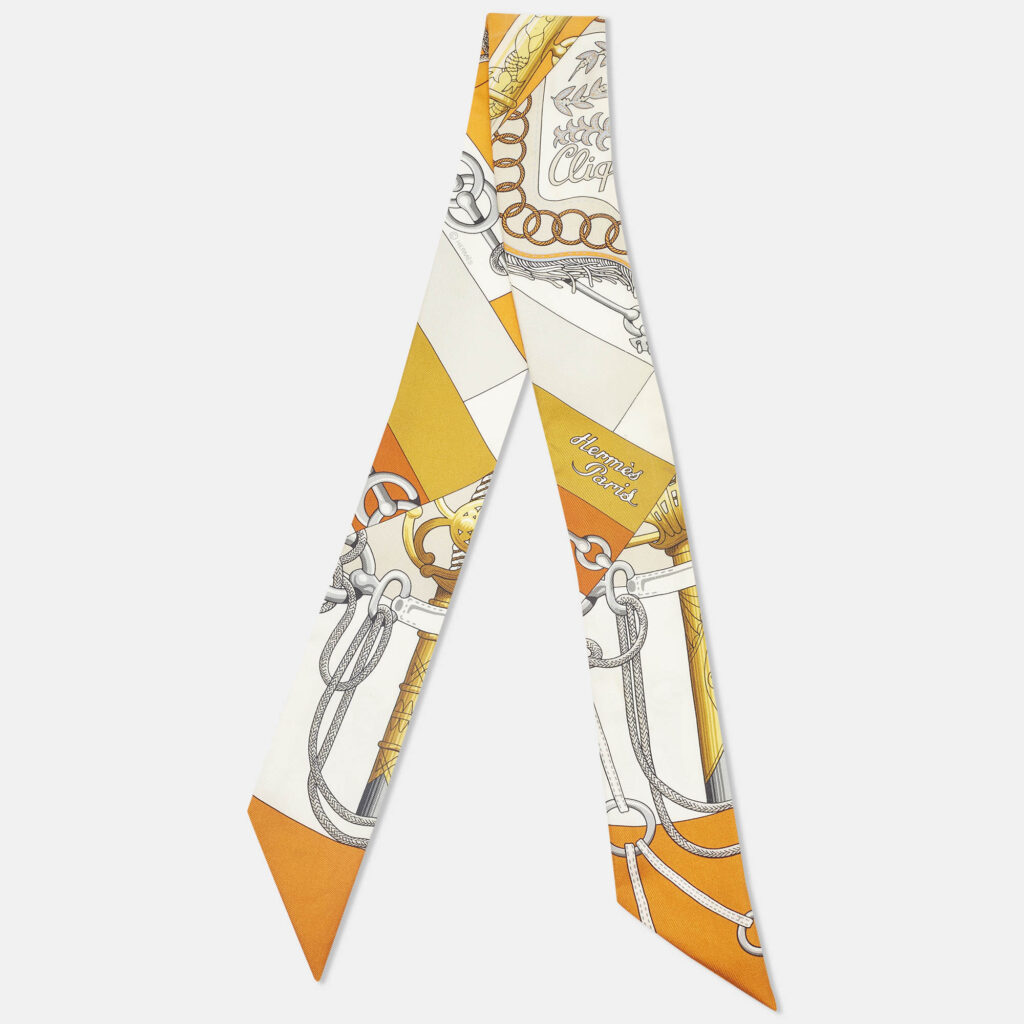 luxury-women-hermes-used-accessories-p1242887-005-1.jpg Hermès Orange Printed Silk Twilly