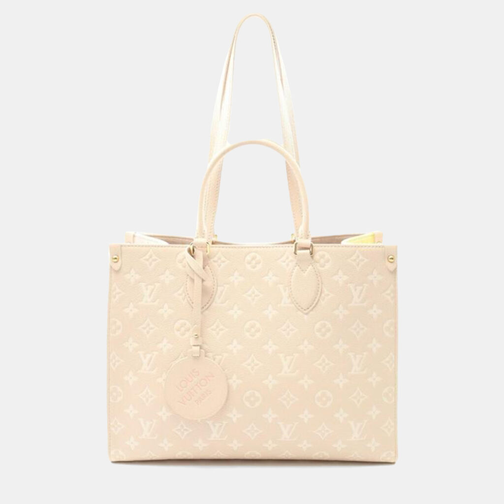 Louis Vuitton OnTheGo MM Rose Beige Monogram Empreinte Leather Tote Bag Louis Vuitton OnTheGo MM Rose Beige Monogram Empreinte Leather Tote Bag