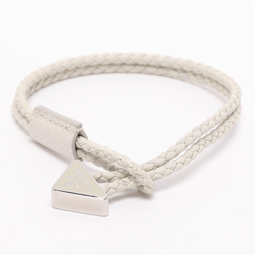Prada Off-White Braided Leather Triangle Charm Bracelet Prada Off-White Braided Leather Triangle Charm Bracelet