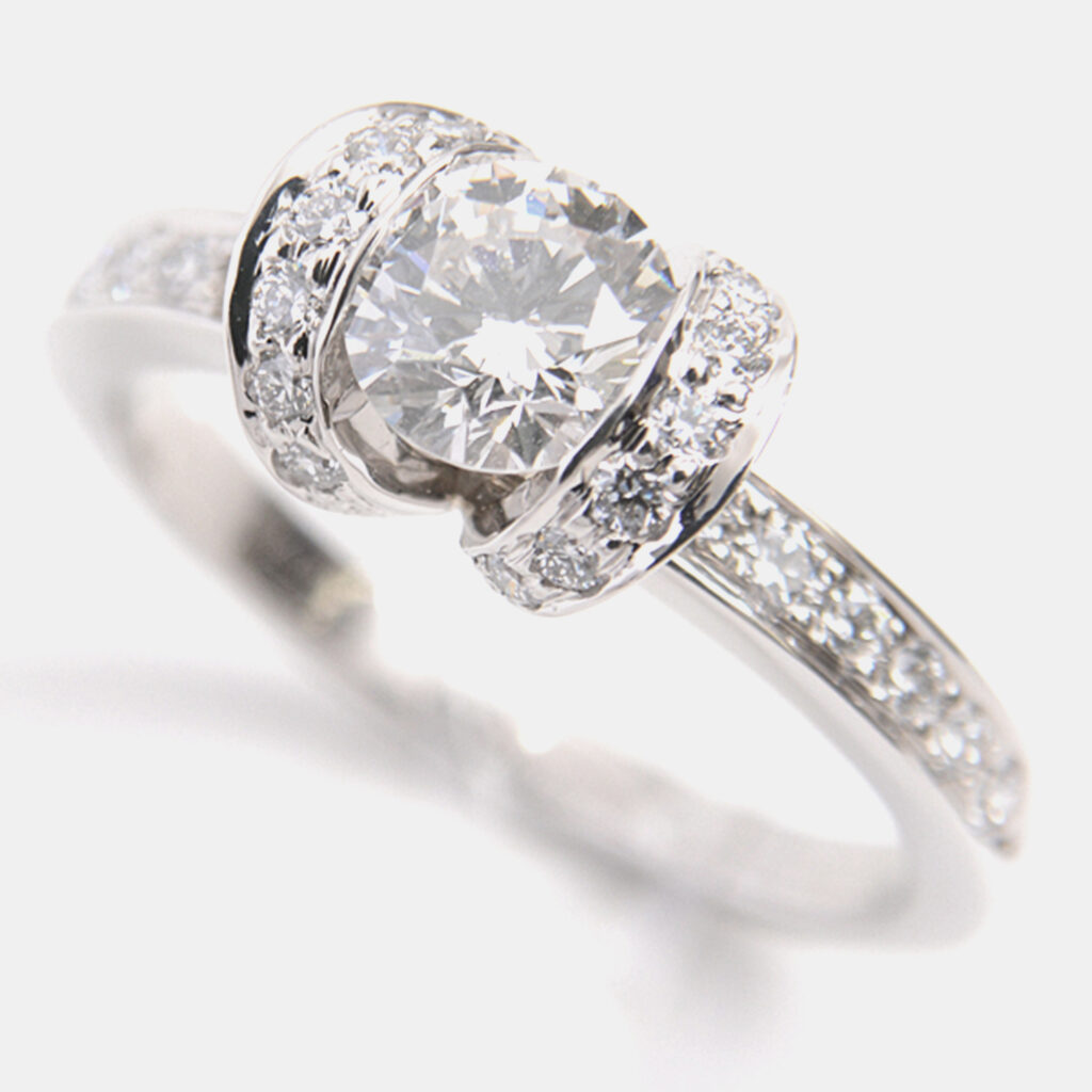 Tiffany & Co. Platinum and Diamond Ribbon Solitaire Ring EU 50 Tiffany & Co. Platinum and Diamond Ribbon Solitaire Ring EU 50