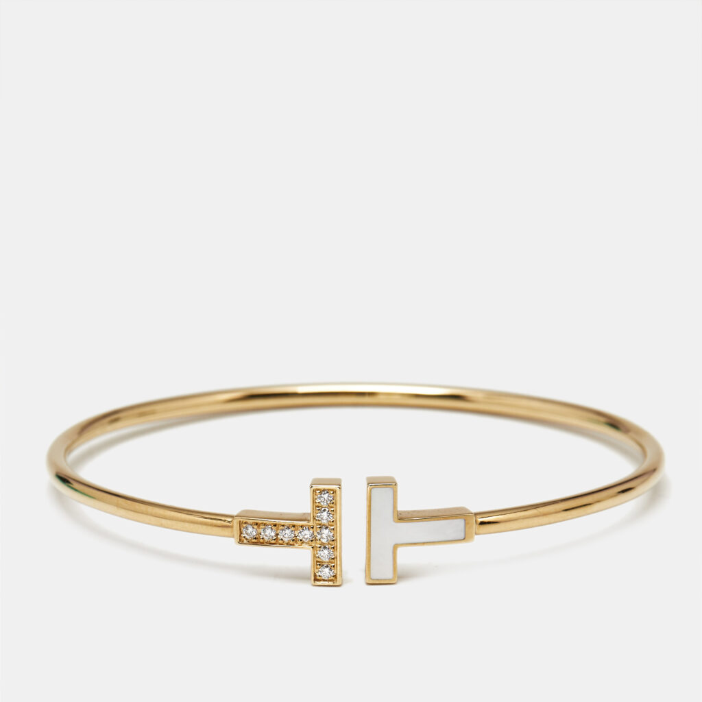 luxury-women-tiffany-co-used-fine-jewelry-p1237229-001-1.jpg Tiffany & Co. Tiffany T Diamond Mother of Pearl 18k Yellow Gold Bracelet
